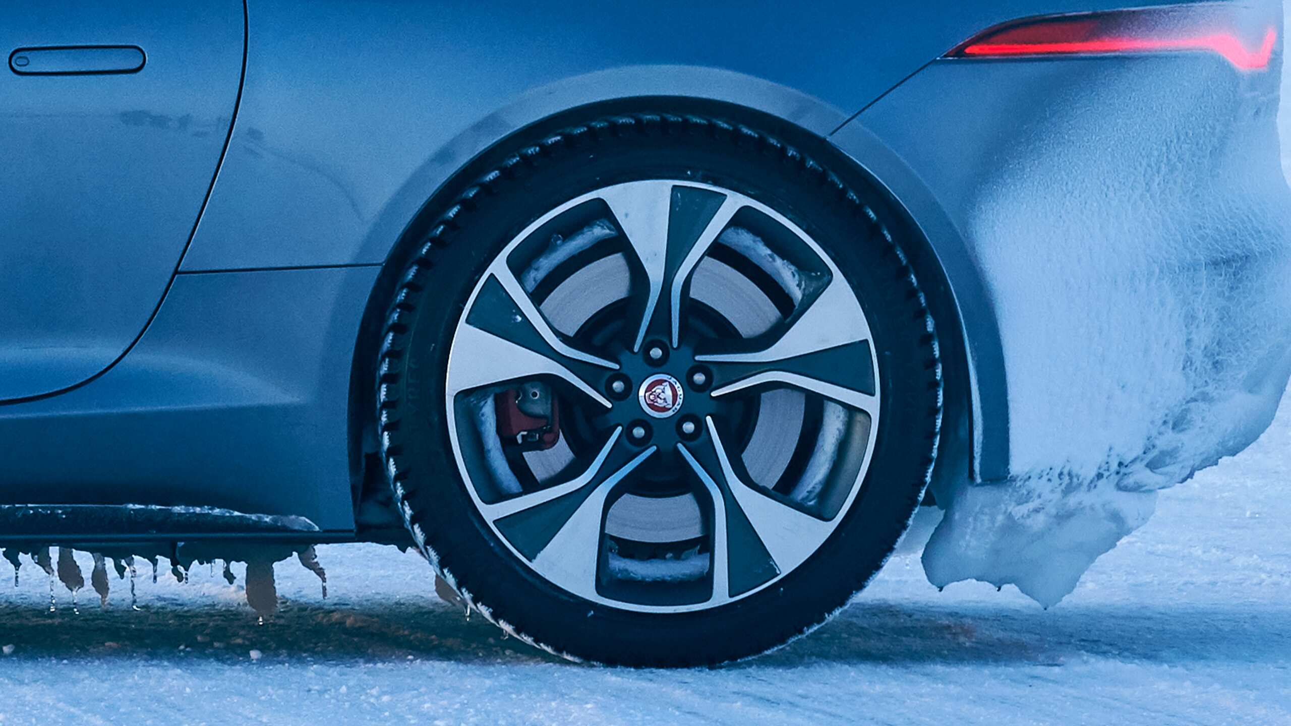 Jaguar FTYPE Parked Through A Road Covered In Ice