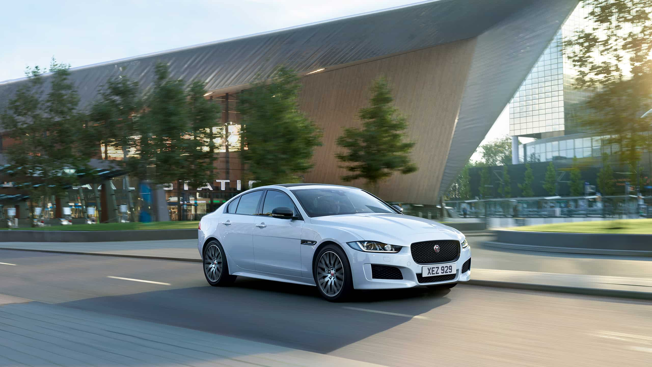 Jaguar XE running on city road